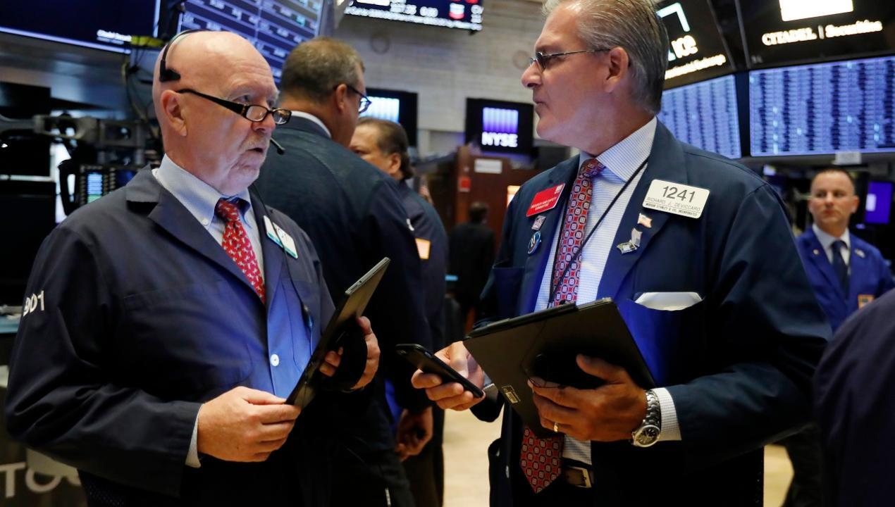 Dow closes up as September ends