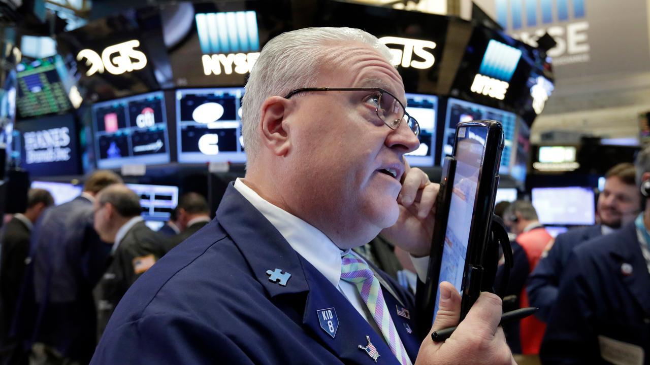 Stocks gain amid strong earnings, fading Syria worries