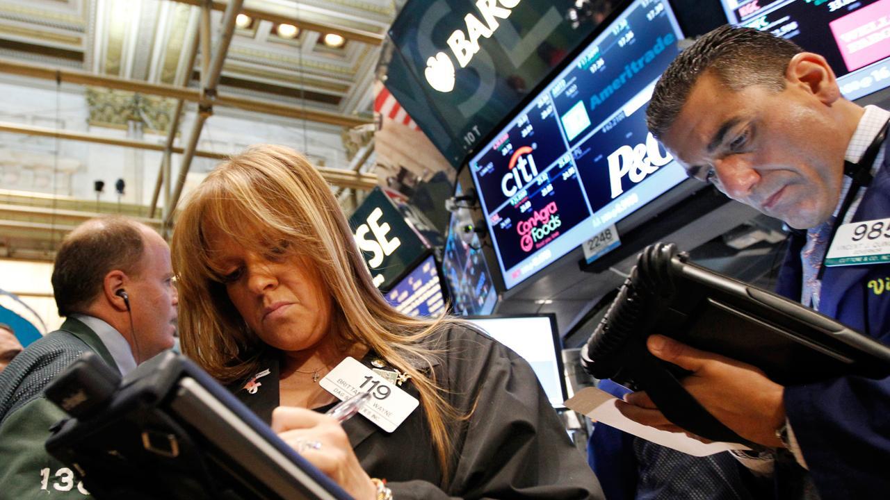 Dow hits record-high in final trading session of July