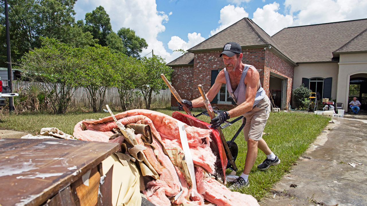 Debris, gutted homes surround Louisiana