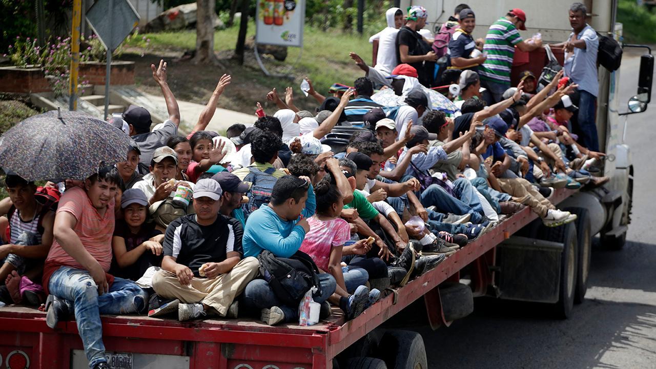 Trump takes tough stance against migrant caravan 