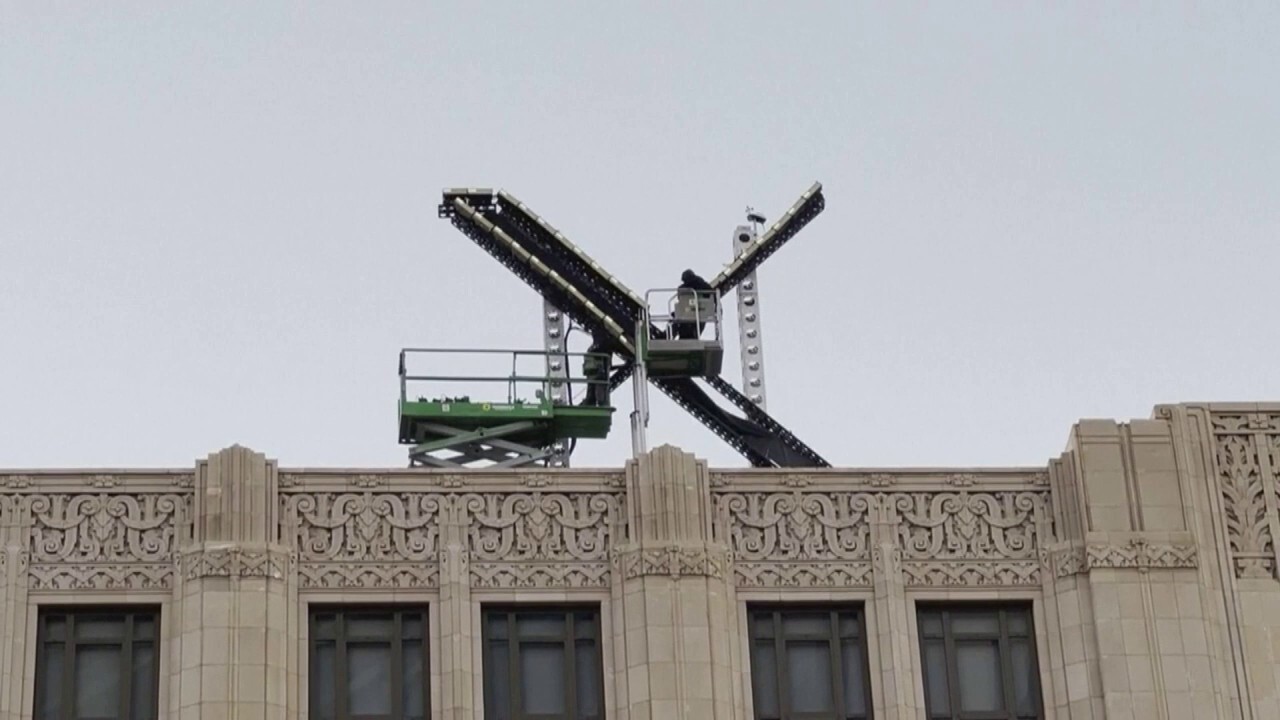 The newly installed X logo atop the San Francisco headquarters of the former Twitter company was removed July 31, 2023. (Stringer via APTN)