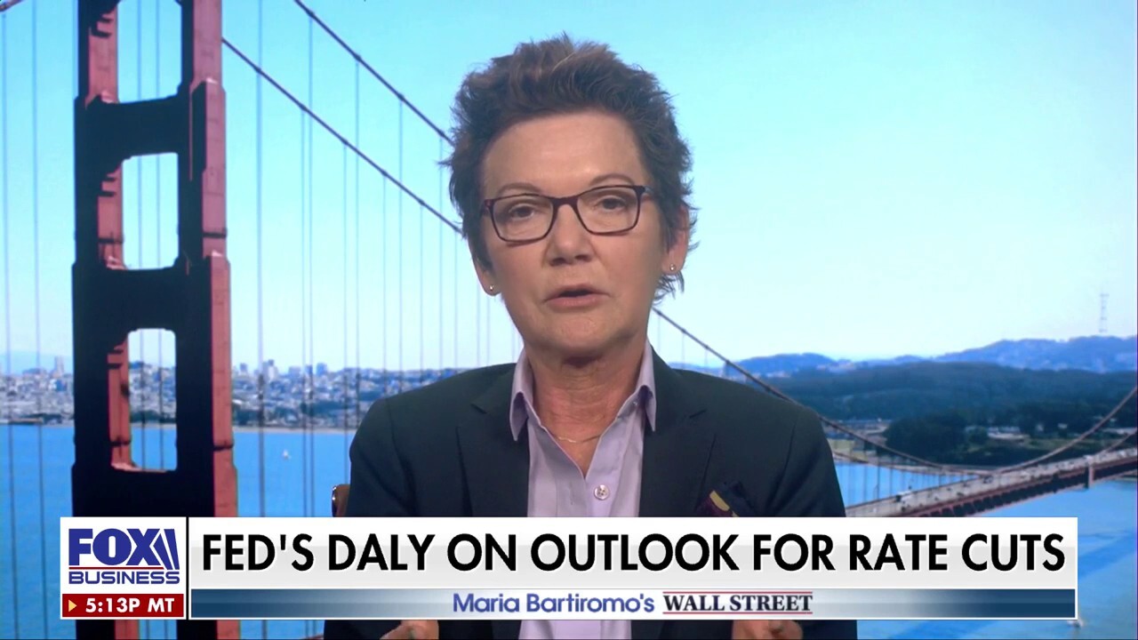 Economy is slower, but people are still getting jobs and consumers are spending, says Fed Reserve president