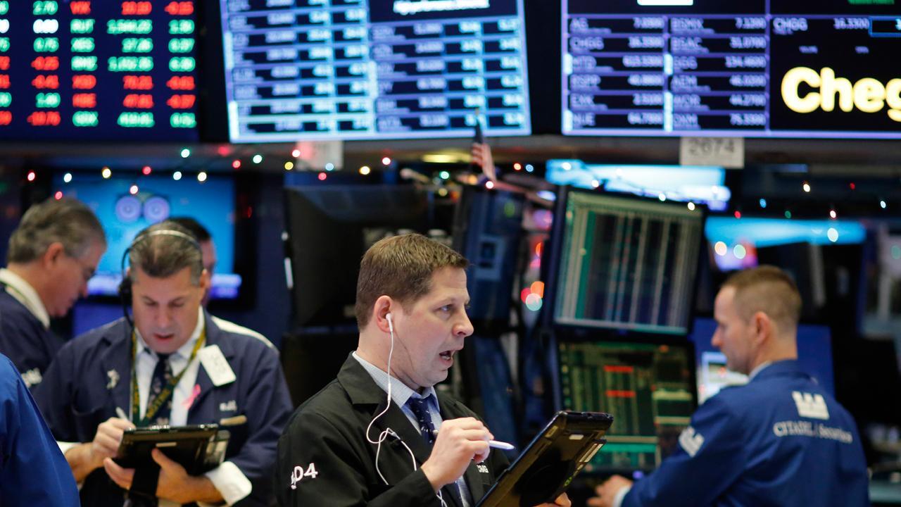 Nasdaq, S&P close at records, Dow ends positive