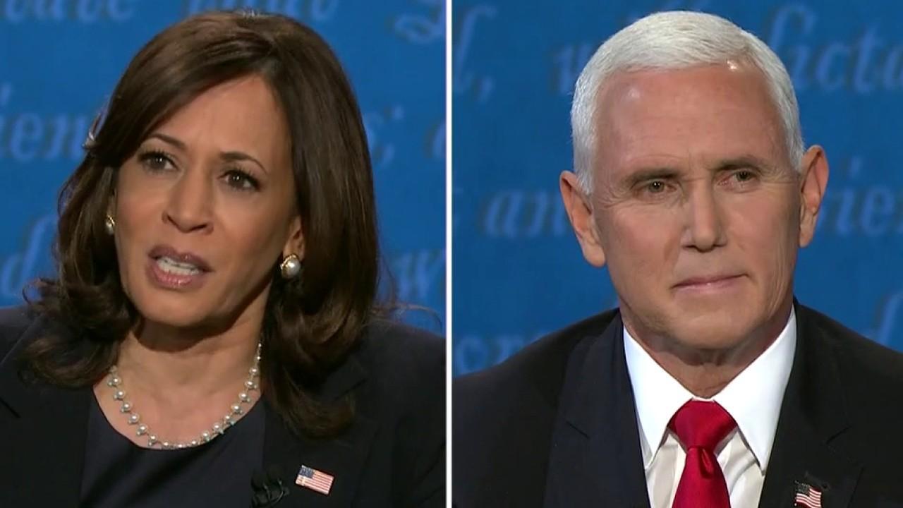 Pence defends against Harris' attack over China trade war