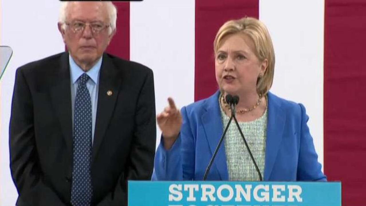 Sanders throws support behind Clinton