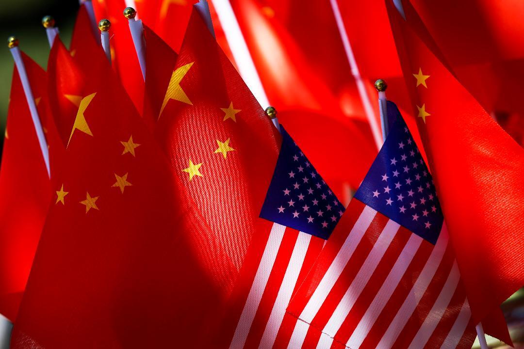 China approves new foreign investment law amid trade tensions with US