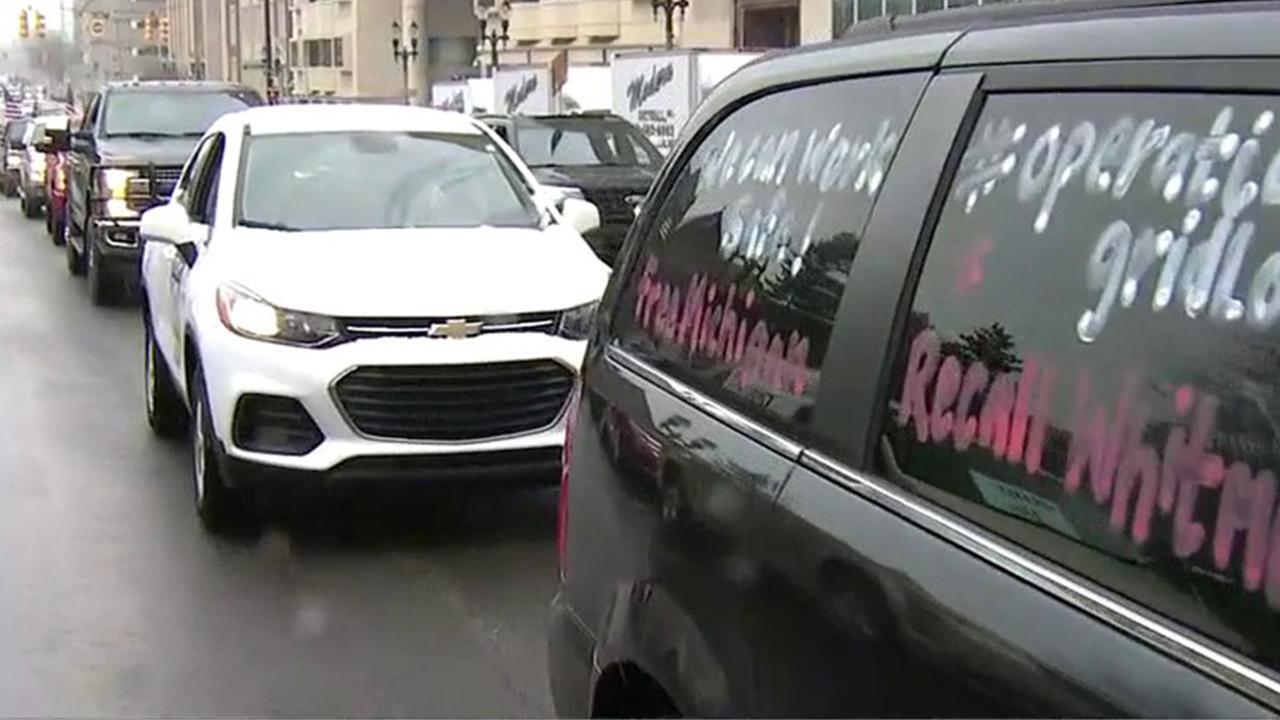 Michiganders protest coronavirus lockdown rules from their cars 