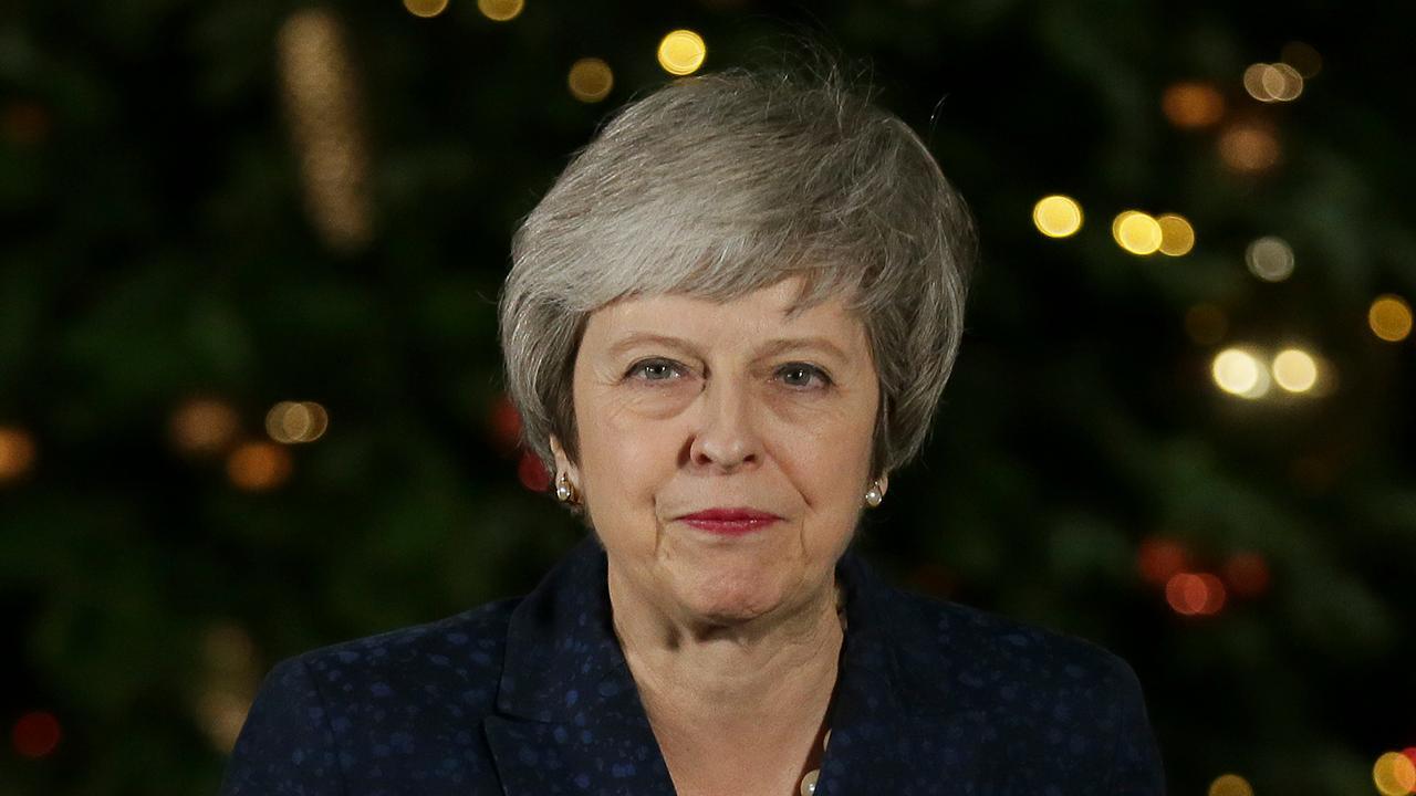 British PM Theresa May speaks after surviving confidence vote