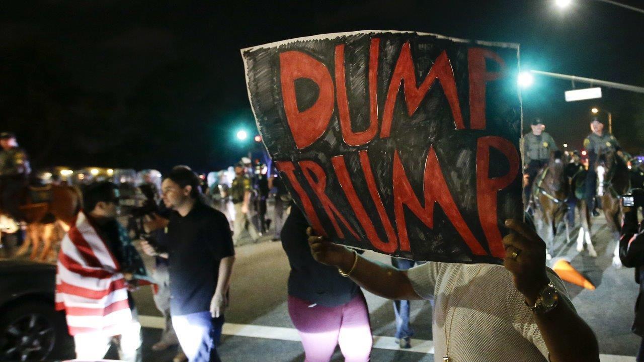 Protests erupt outside Trump rally in California