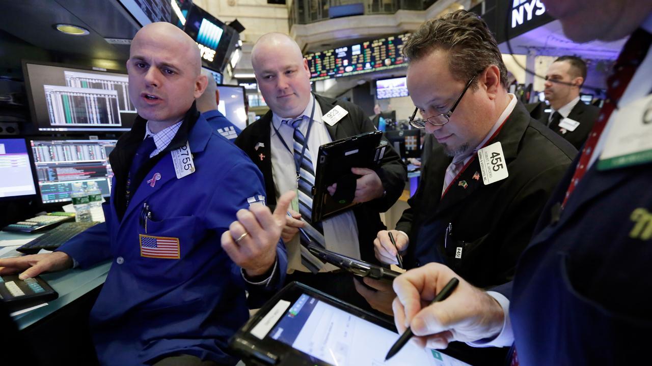 Dow rebounds at the close after volatile trading session