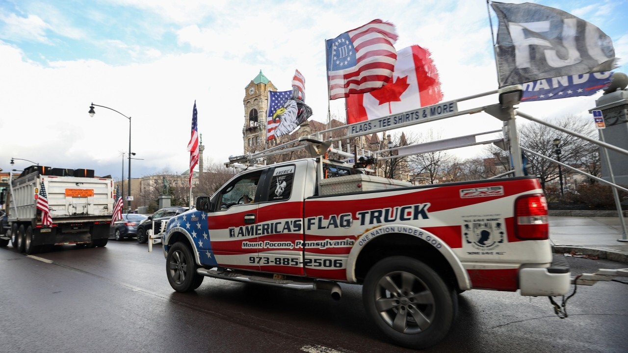 US trucker convoys drive to DC, National Guard troops deployed