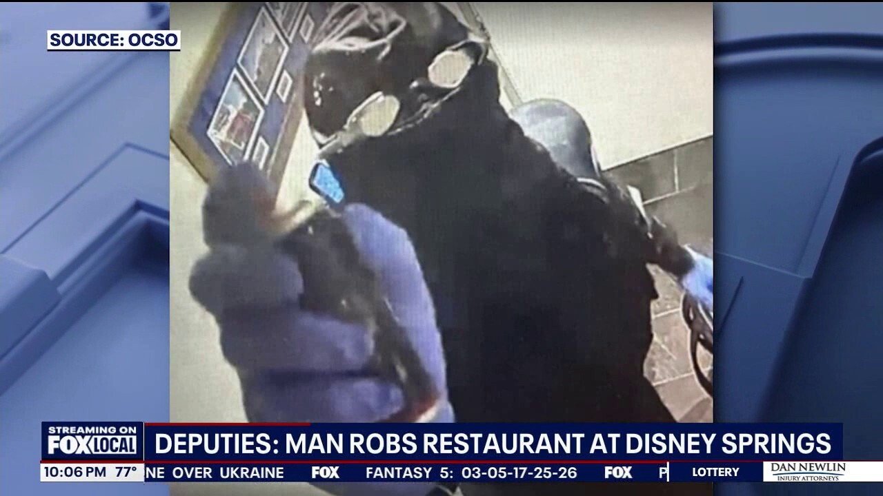 Deputies with the Orange County Sheriff's Office are searching for the goggle-wearing person who robbed a popular restaurant in Disney Springs on Monday, FOX 35 Orlando reports. 
