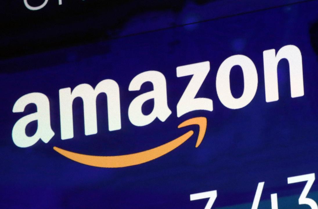 Amazon shares fall amid Bezos-Enquirer feud 