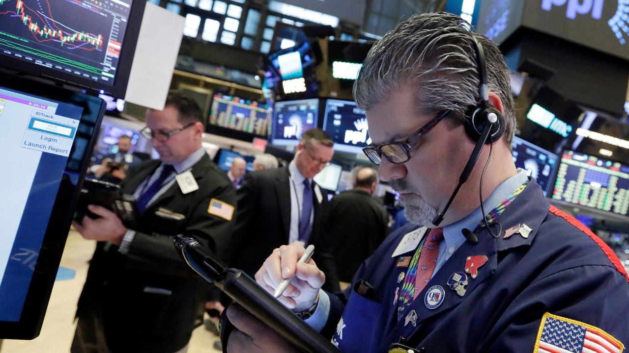 Stocks climb on French election, Trump tax news