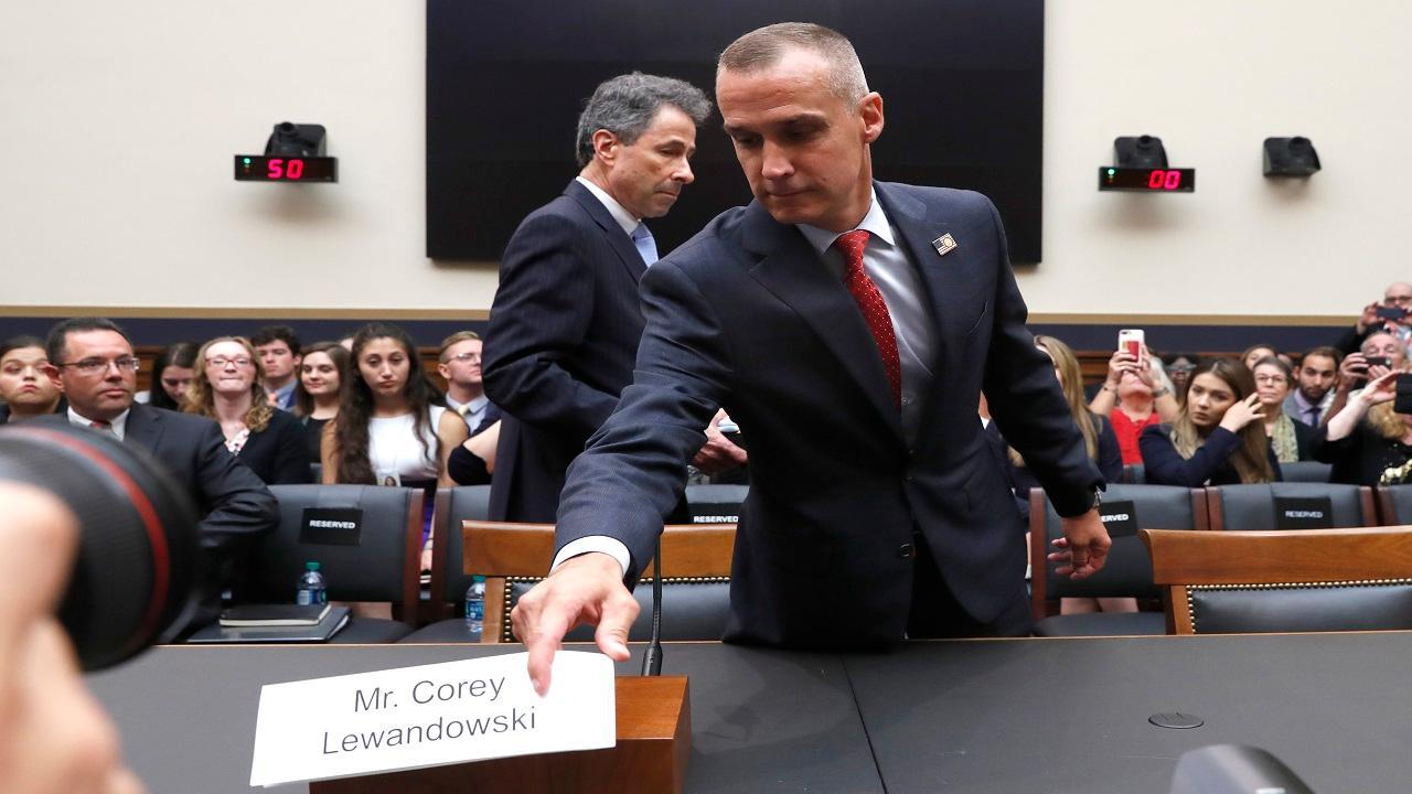 How are the left and right reacting to Corey Lewandowski's testimony?