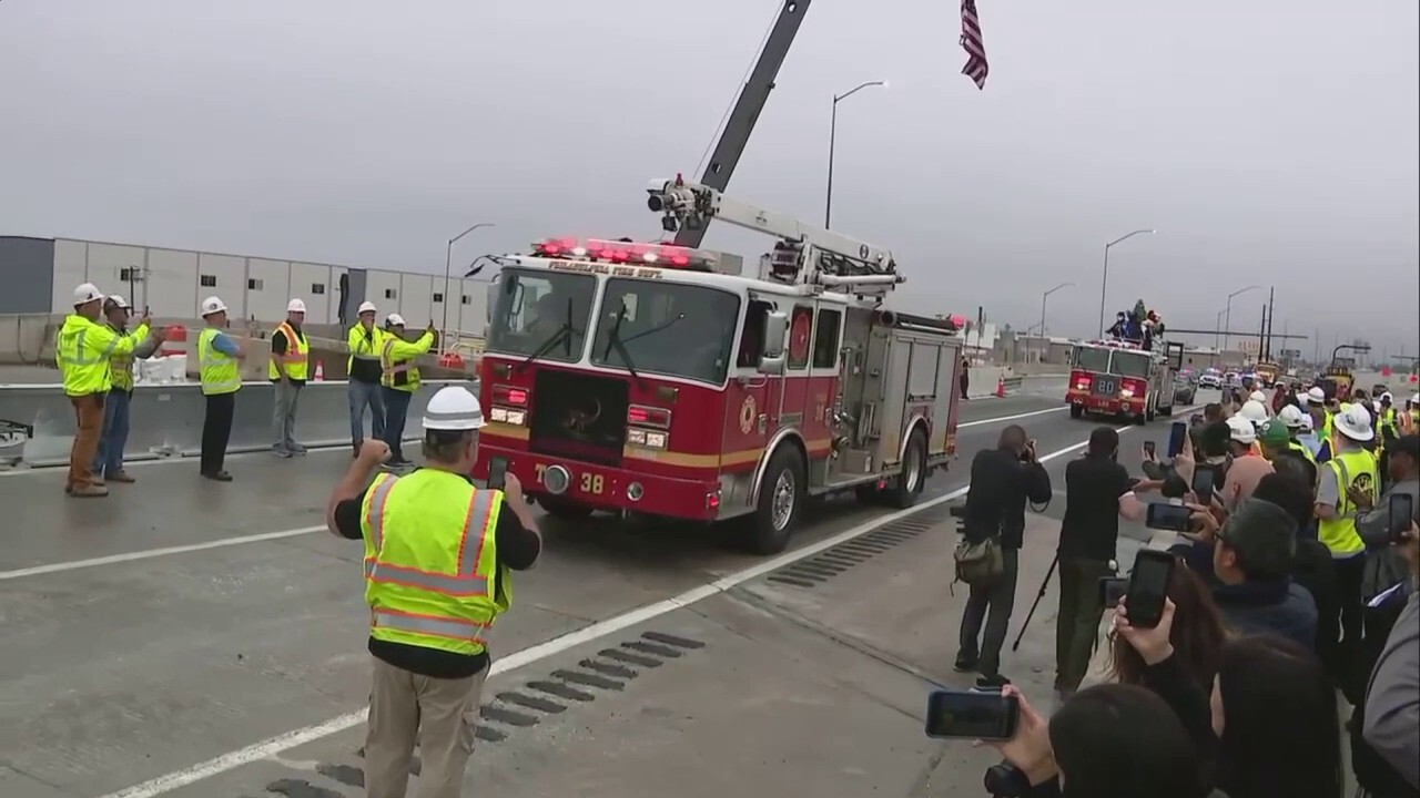 Vehicles cross the I-95 bridge in Philadelphia for the first time since a deadly tanker caused the bridge to collapse less than two weeks ago. (WTXF)