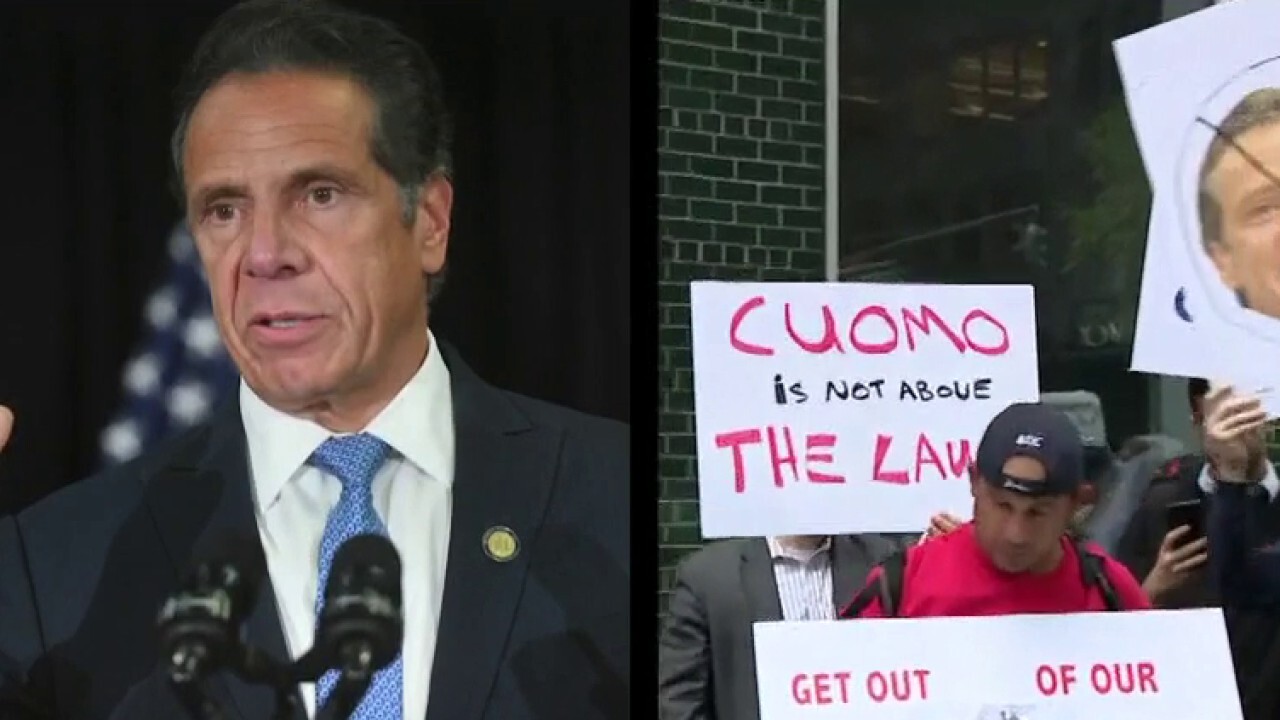 Protests grow outside Cuomo's office after 'stunning' sexual harassment report