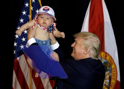 Trump gets baby from crowd