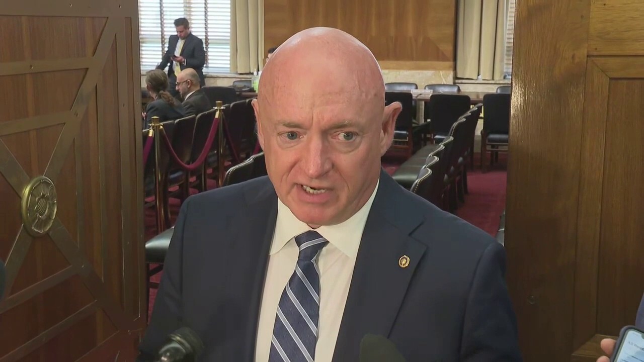 Sen. Mark Kelly, D-Ariz., said prices are "still too high," adding that the White House and Congress need to "work on it," in remarks on Capitol Hill, May 5, 2022.