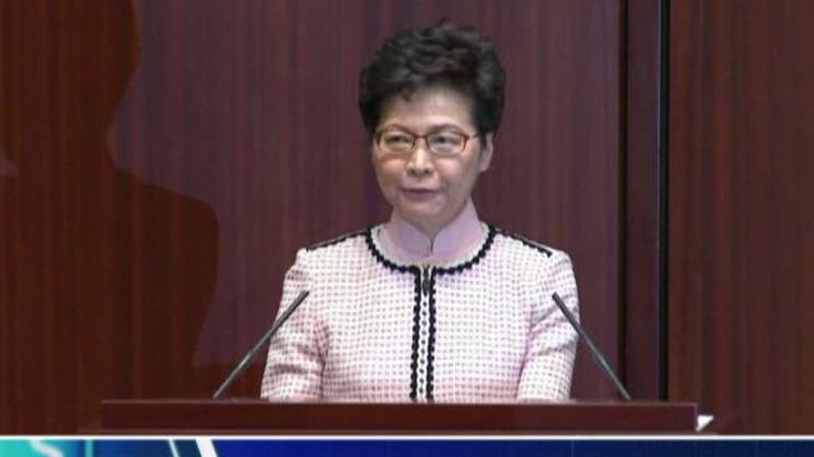 Hong Kong's Carrie Lam heckled before addressing Parliament 