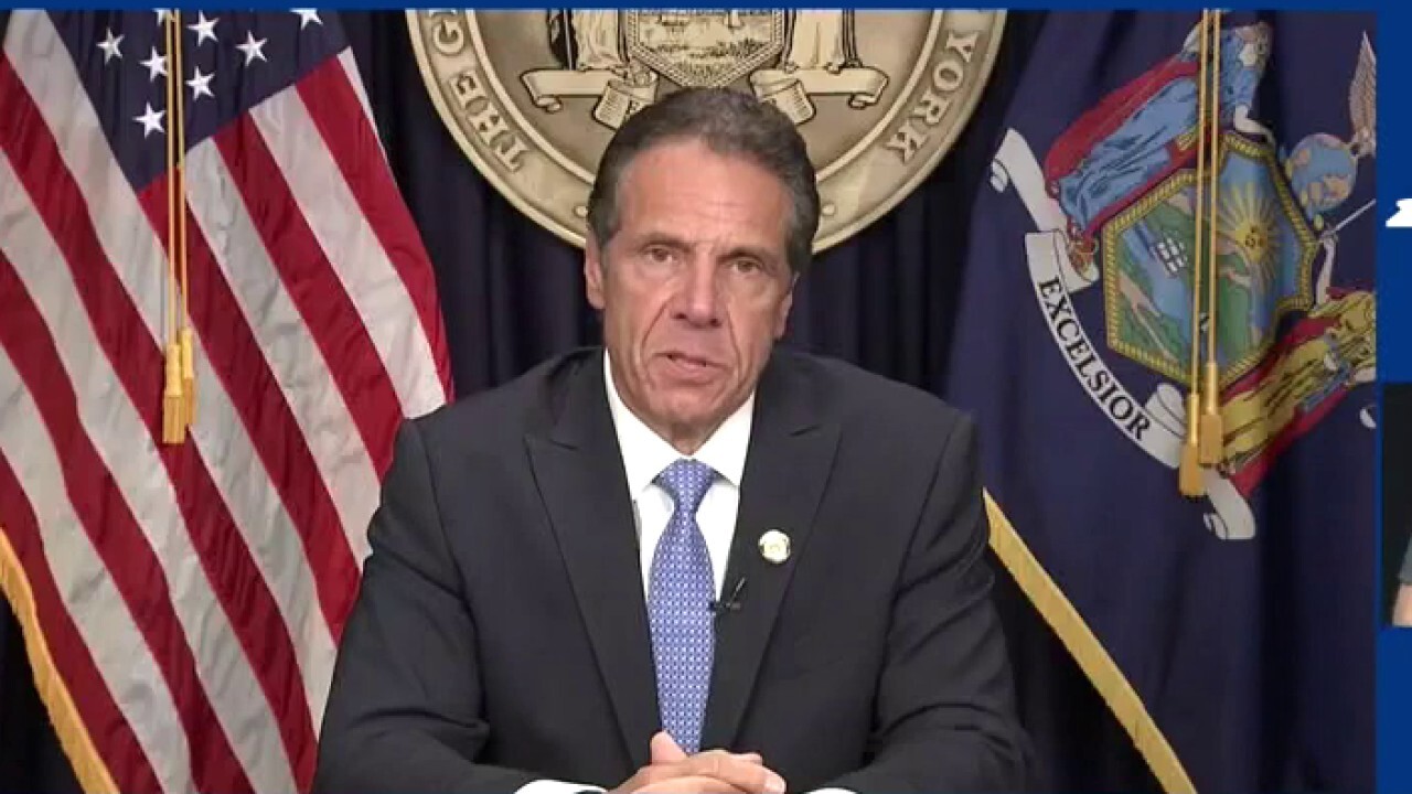 Cuomo resigns as NY governor, effective in 14 days