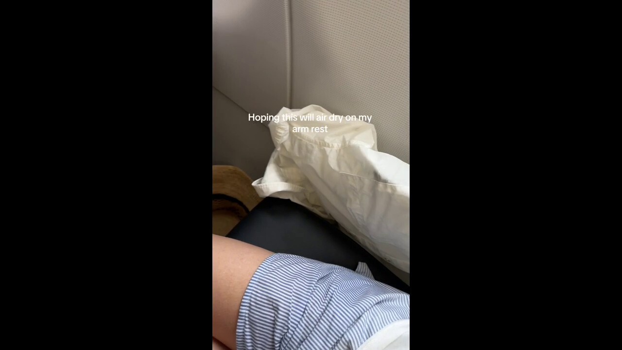 TikTok creator Savannah Gowarty posted a viral video that shows passengers on an airplane becoming drenched from a mist seeping out of the air vents. CREDIT: Savannah Gowarty/ @savinnyc