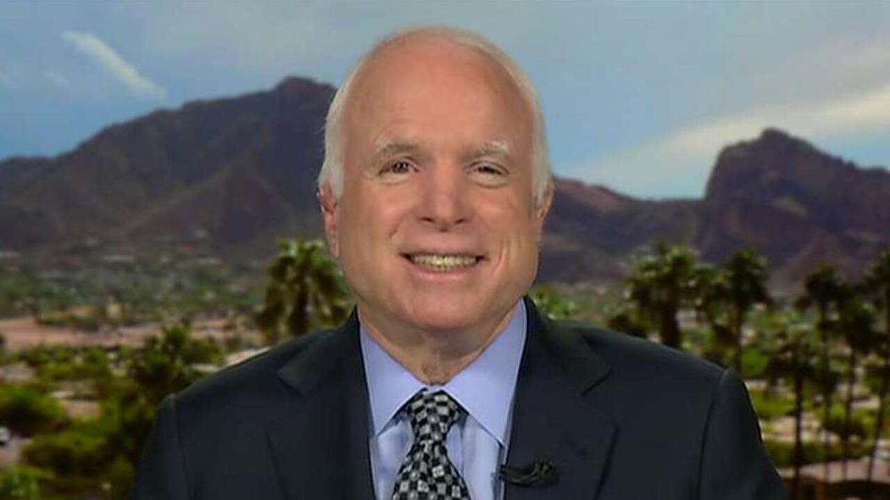 McCain: Iran now has us by the throat 