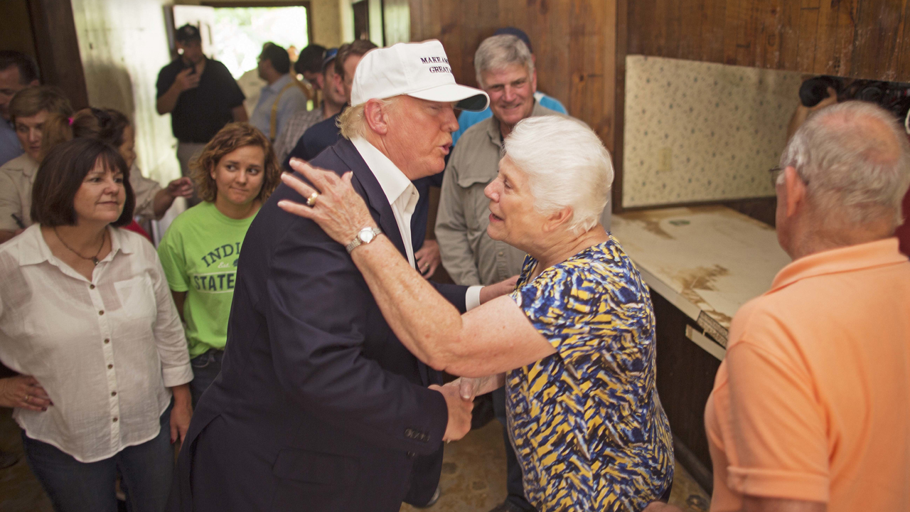 Trump visits flood-ravaged Louisiana