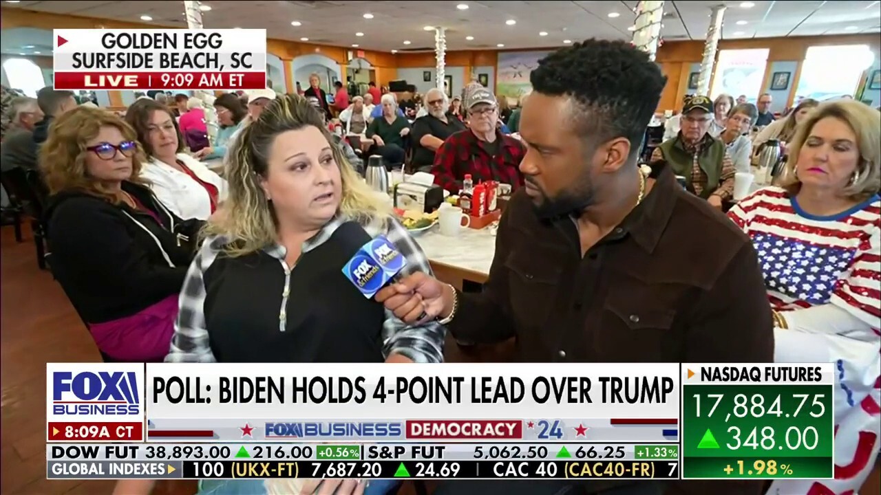 'Fox & Friends' co-host Lawrence Jones speaks to a business owner at the Golden Egg diner in Surfside Beach, South Carolina.