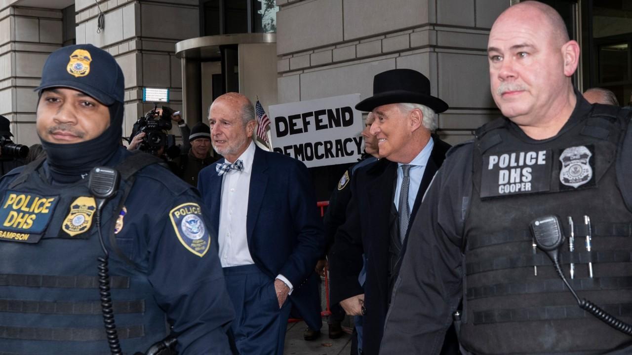 Roger Stone leaves courthouse to chants of ‘lock him up’