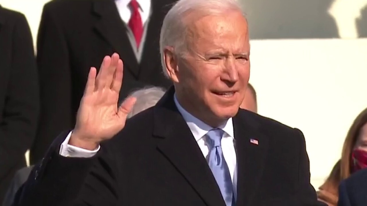 President Joseph R. Biden Jr. is sworn in by Supreme Court Chief Justice John Roberts at the U.S. Capitol in Washington, D.C.