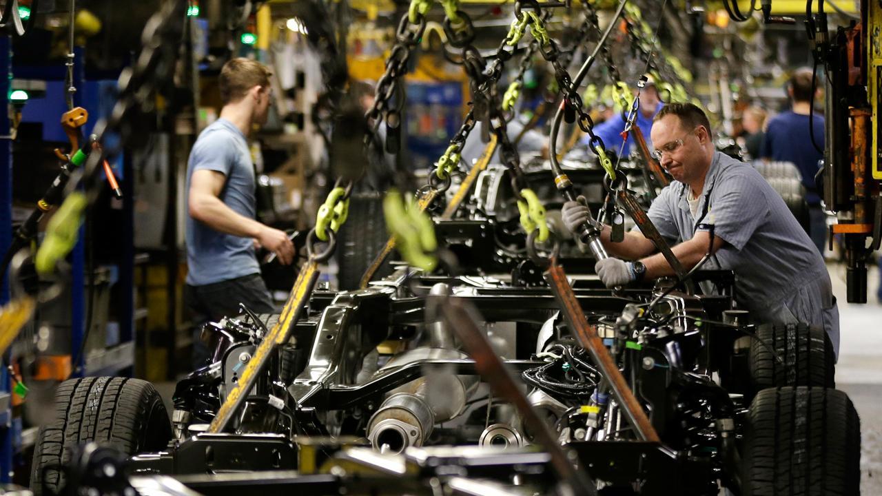 Manufacturing eases slightly in November 