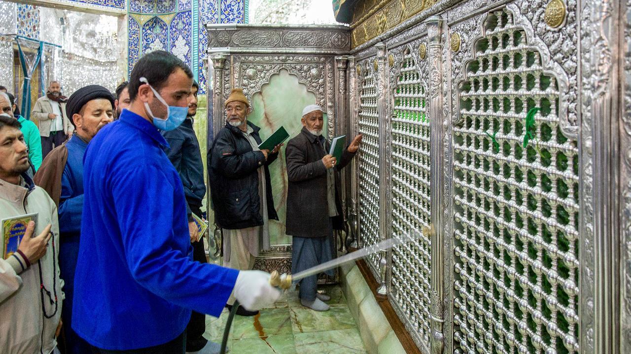 Iranians in Qom lick shrine to contract coronavirus