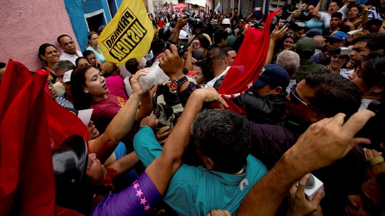 How is the Venezuelan government holding on to power?