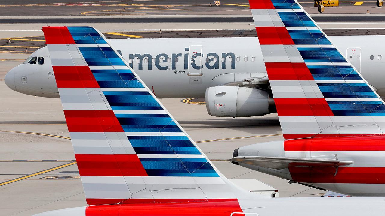 American Airlines reportedly slashing international flights; Walt Disney to furlough non-essential workers