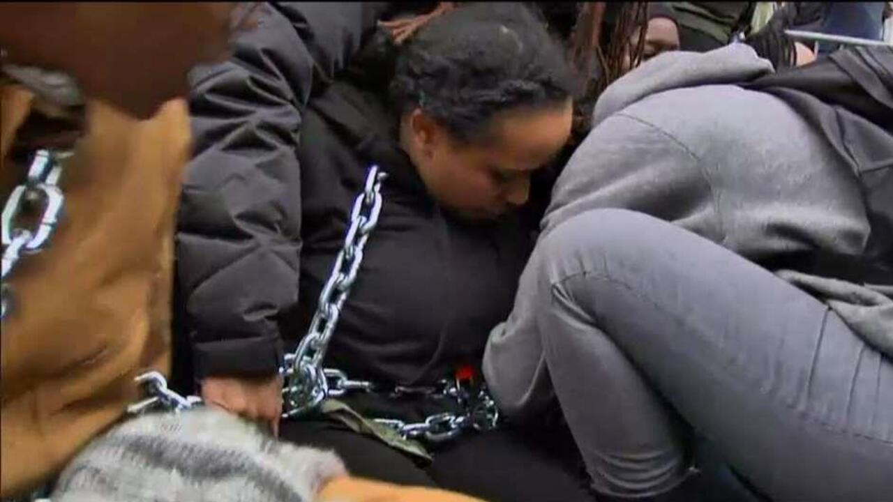 Black Lives Matter chain themselves together at inauguration checkpoints