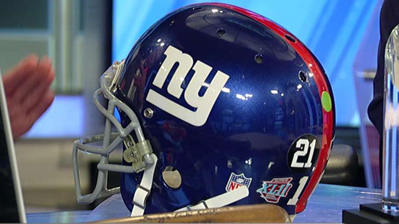 Eli Manning helmet could net up to $1M in auction 