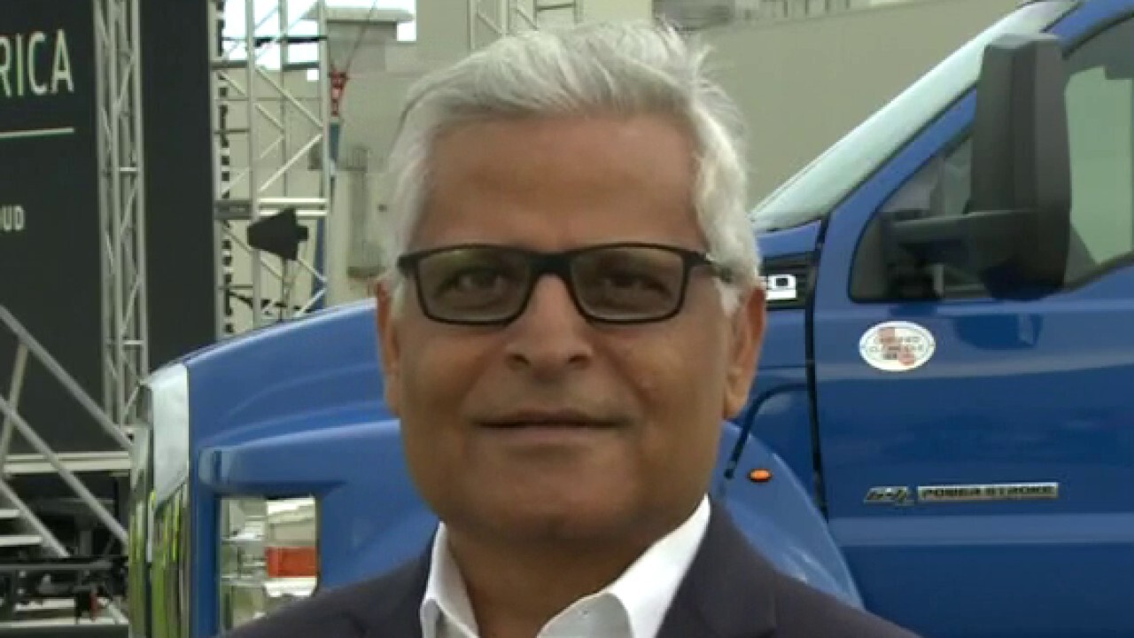 Ford President Kumar Galhotra explains what it would take to get the cost of an electric vehicle down for consumers. 