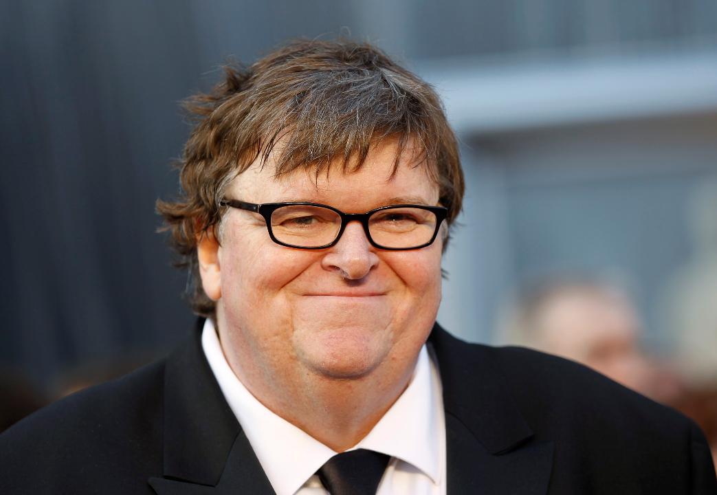 Michael Moore lashes out at President Trump on Twitter