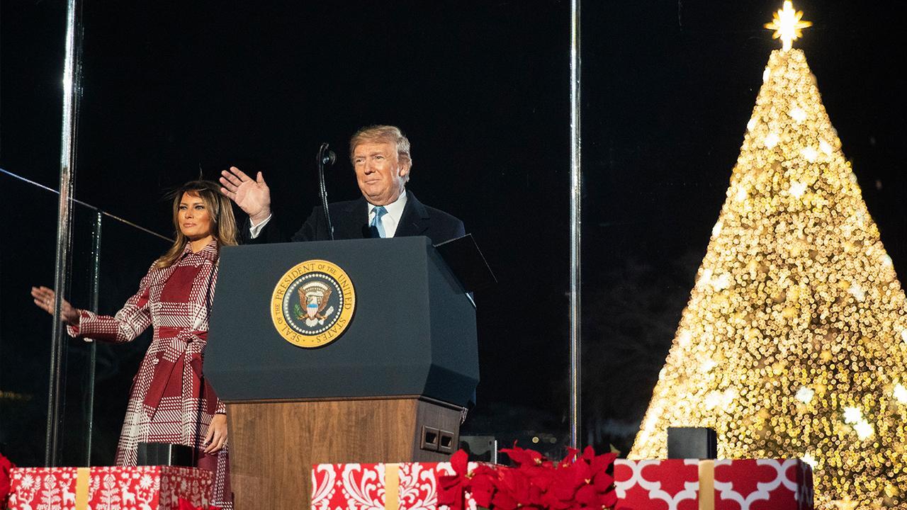 President Trump, First Lady light the White House Christmas tree