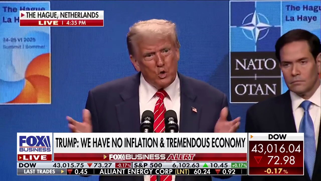 President Donald Trump addresses his criticism of Federal Reserve Chairman Jerome Powell while taking questions at the NATO summit