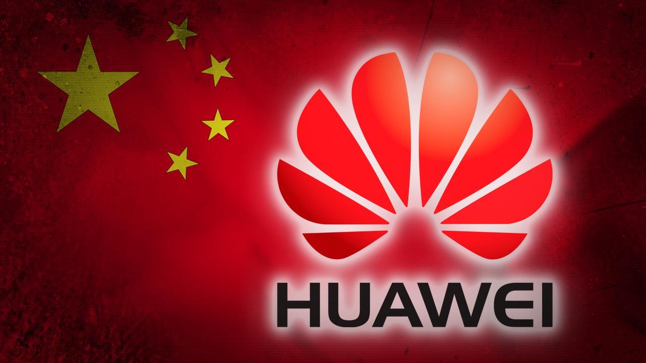 Huawei charged by Justice Dept. with racketeering , conspiracy 