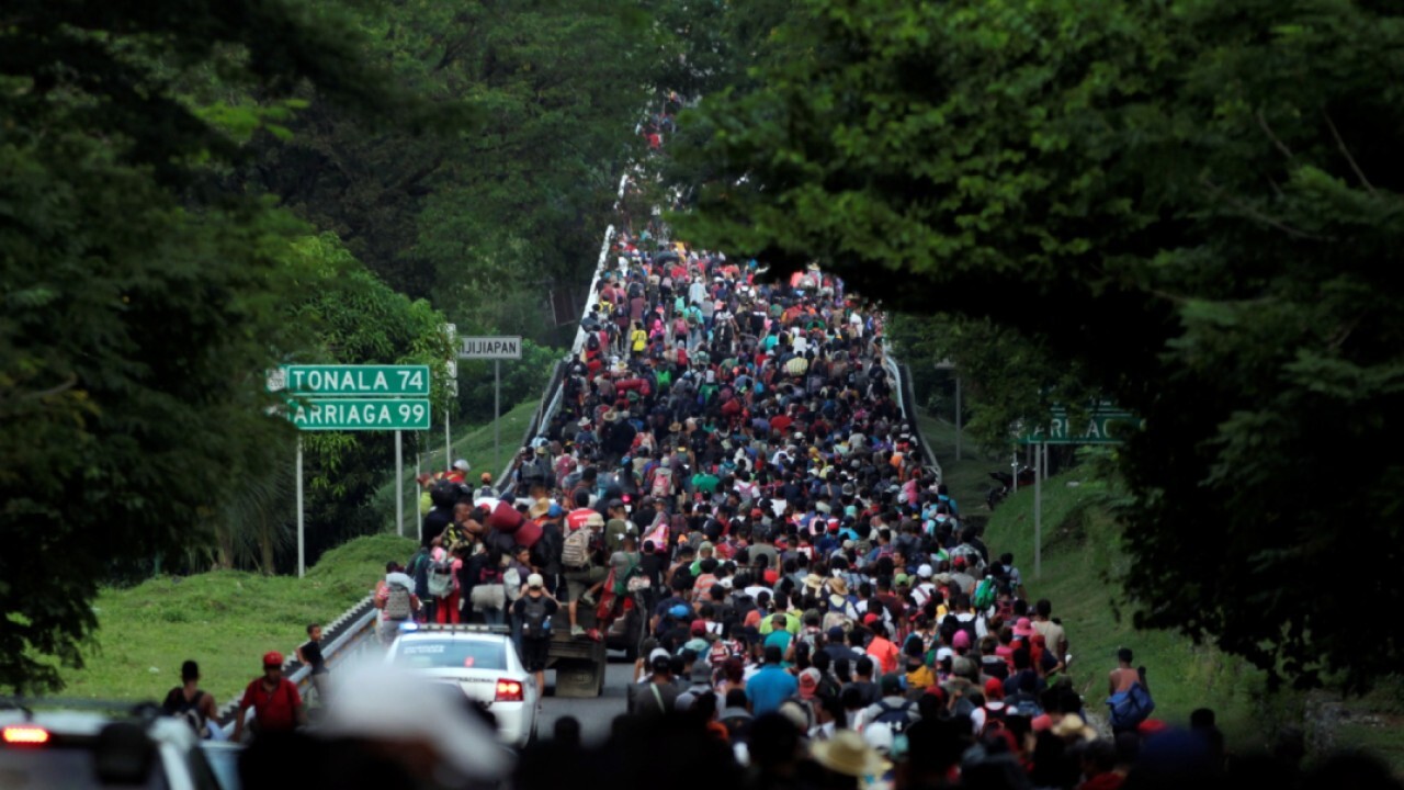 Record migrant caravan heading for southern border