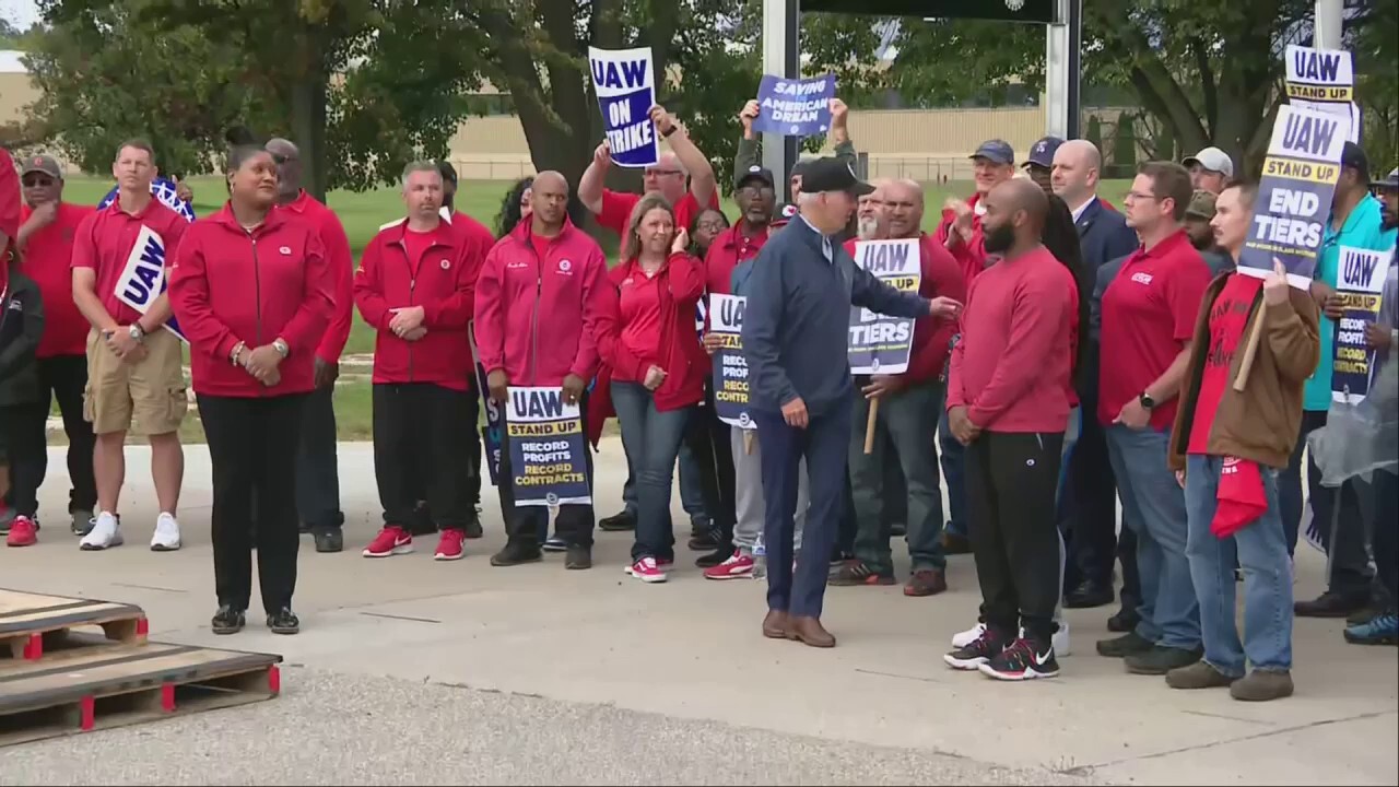 United Auto Workers President Shawn Fain said during a speech with President Joe Biden watching that Ford, General Motors and Stellantis could be likened to the Axis powers during World War II.