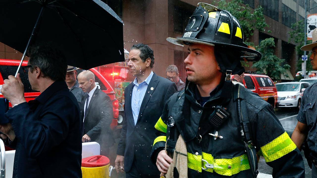 Helicopter crashes into building in New York City