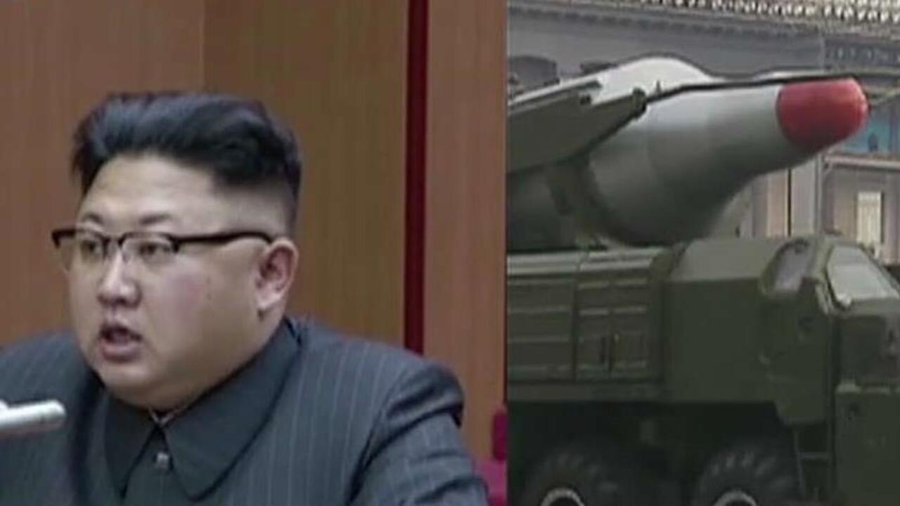 North Korea making nuclear warhead to fit in missile: report