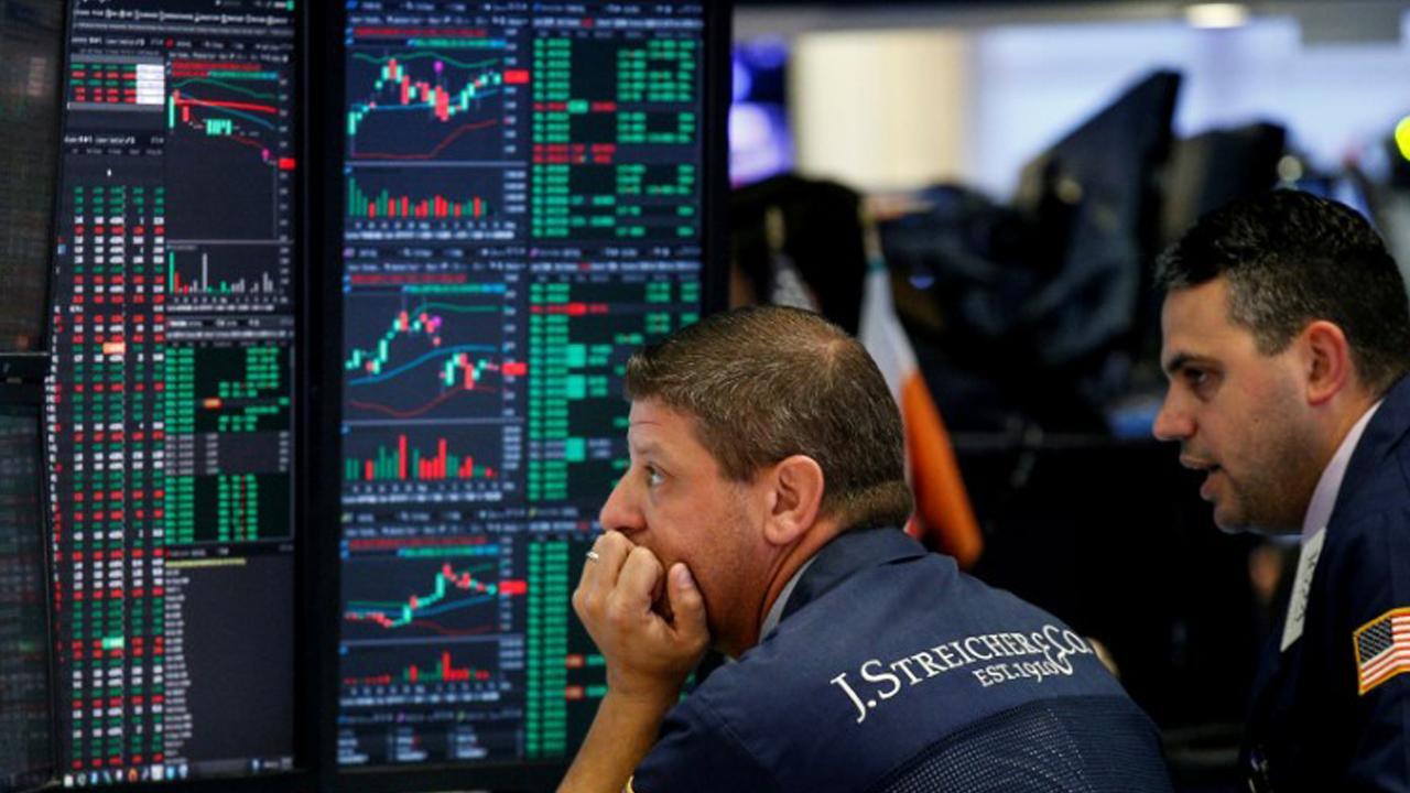 Markets close at another record