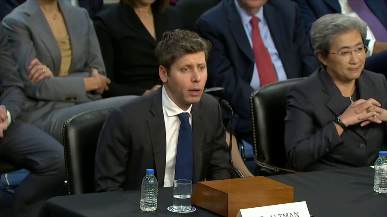 OpenAI CEO Sam Altman offers opening remarks before Sen. Ted Cruz's committee.