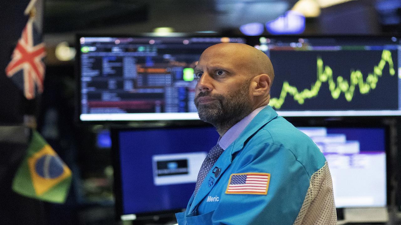 Stocks turning negative on trade uncertainty